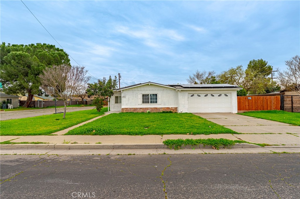 2690 Hawthorne Avenue Merced, CA 95340 - Photo 1 of 36 a view of backyard of house garage and trees
