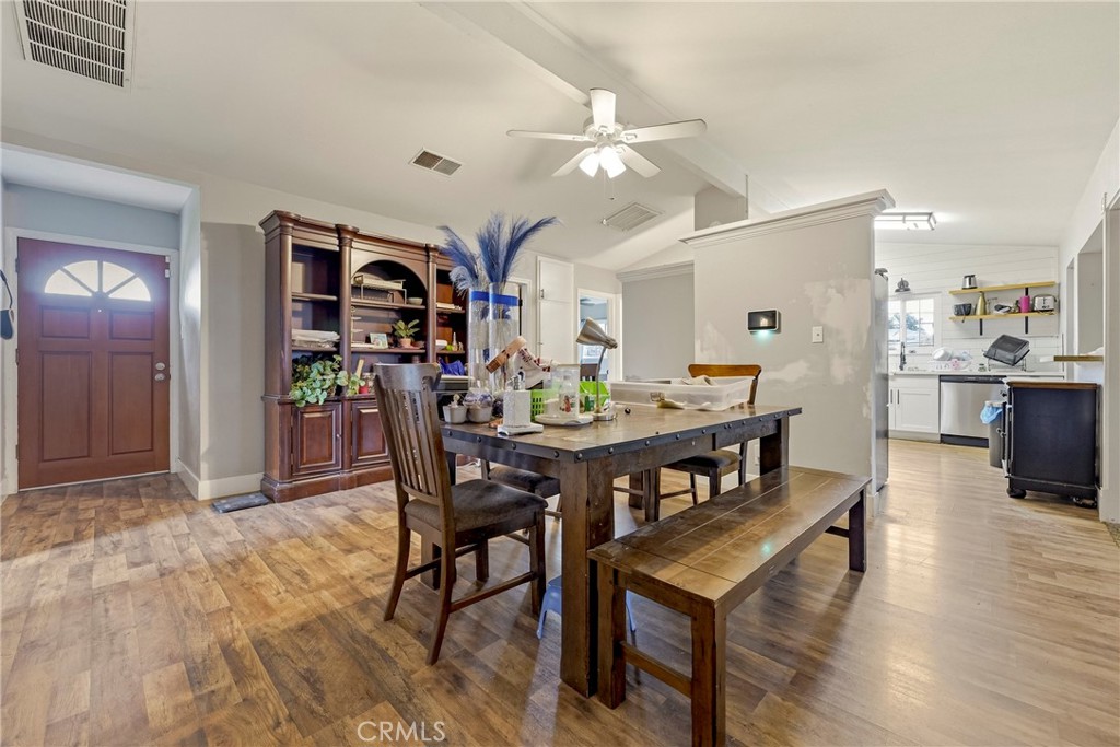 2690 Hawthorne Avenue Merced, CA 95340 - Photo 14 of 36 a view of a dining room with furniture and wooden floor