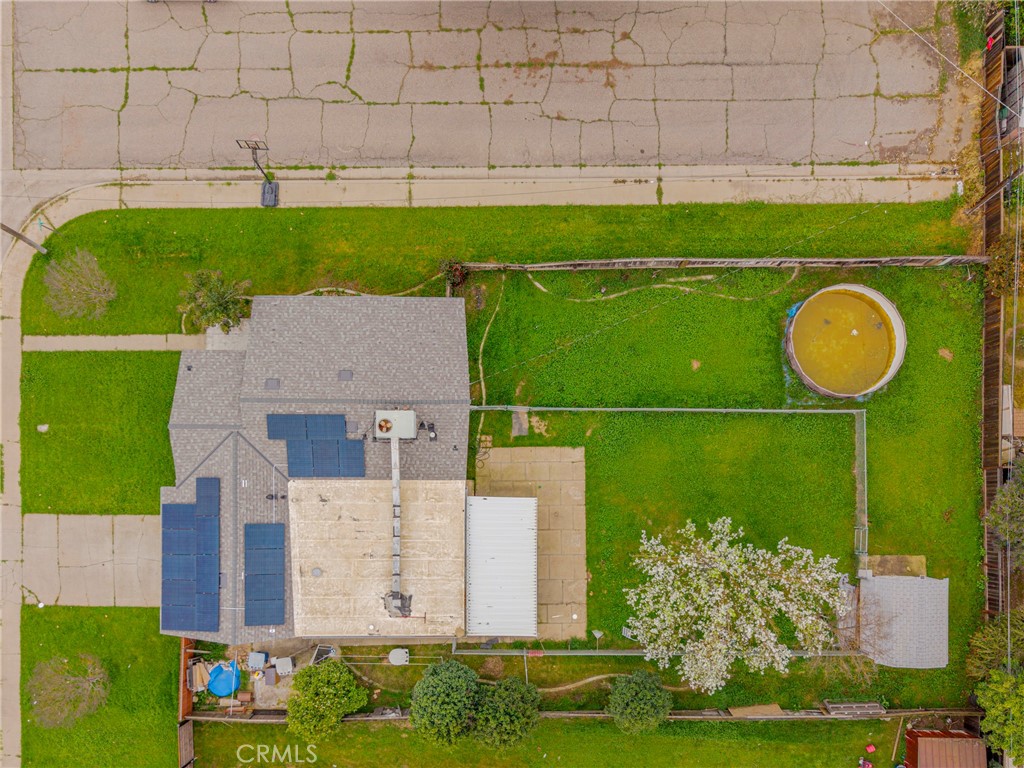 2690 Hawthorne Avenue Merced, CA 95340 - Photo 36 of 36 an aerial view of a house with a garden and a swimming pool