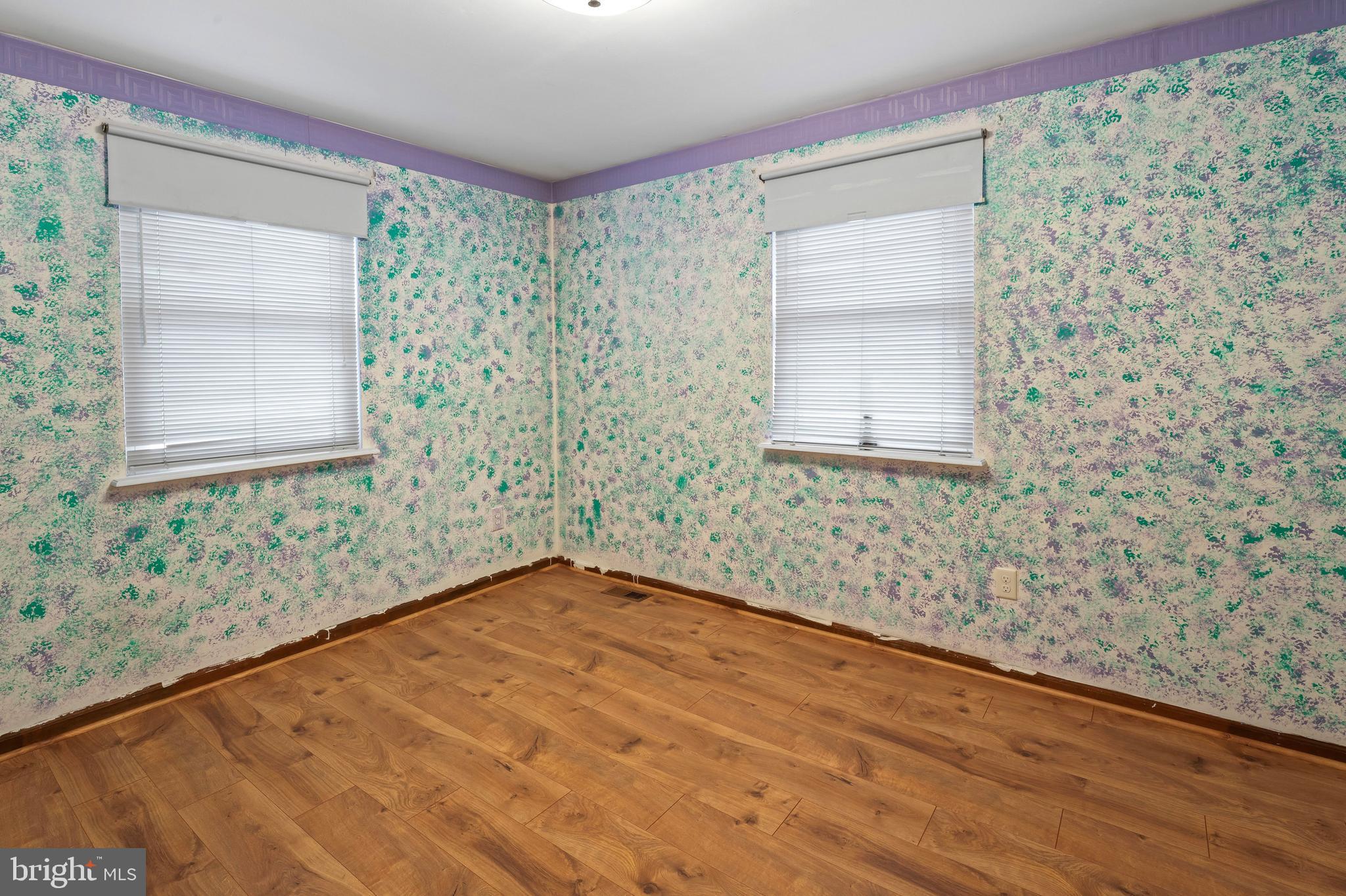 117 East 12th Avenue Pine Hill, NJ 08021 - Photo 13 of 19 a view of an empty room with a window