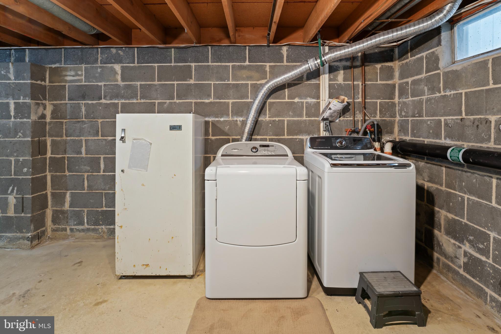 117 East 12th Avenue Pine Hill, NJ 08021 - Photo 15 of 19 a utility room with dryer and washer