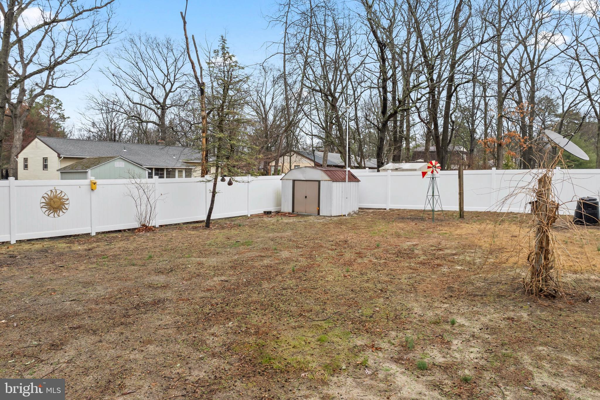 117 East 12th Avenue Pine Hill, NJ 08021 - Photo 16 of 19 a view of white house with a yard
