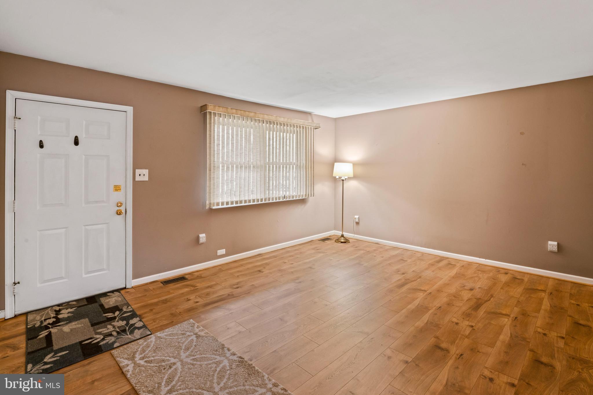 117 East 12th Avenue Pine Hill, NJ 08021 - Photo 2 of 19 a view of an empty room and window