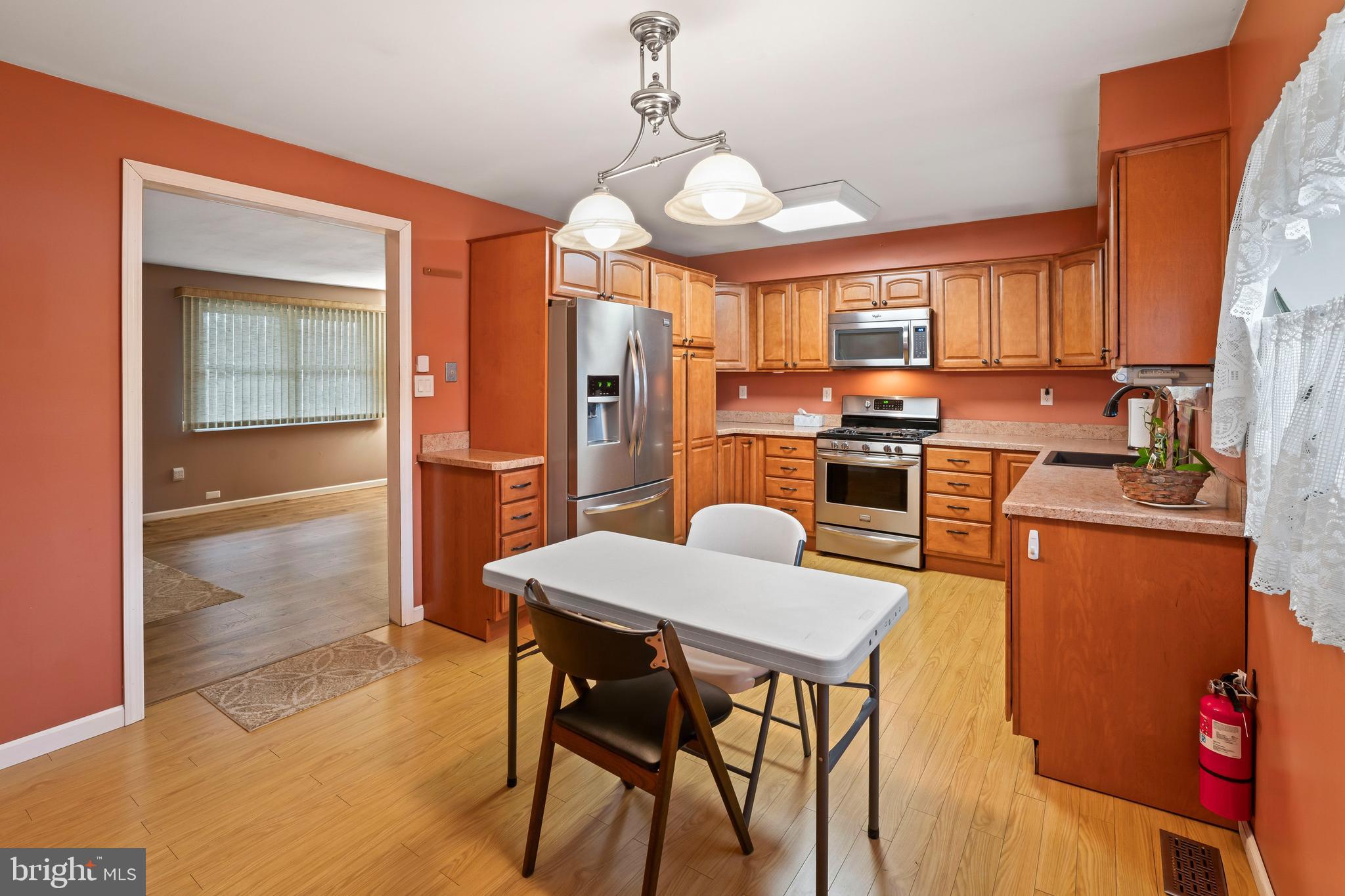 117 East 12th Avenue Pine Hill, NJ 08021 - Photo 8 of 19 a view of a dining room with furniture window and wooden floor