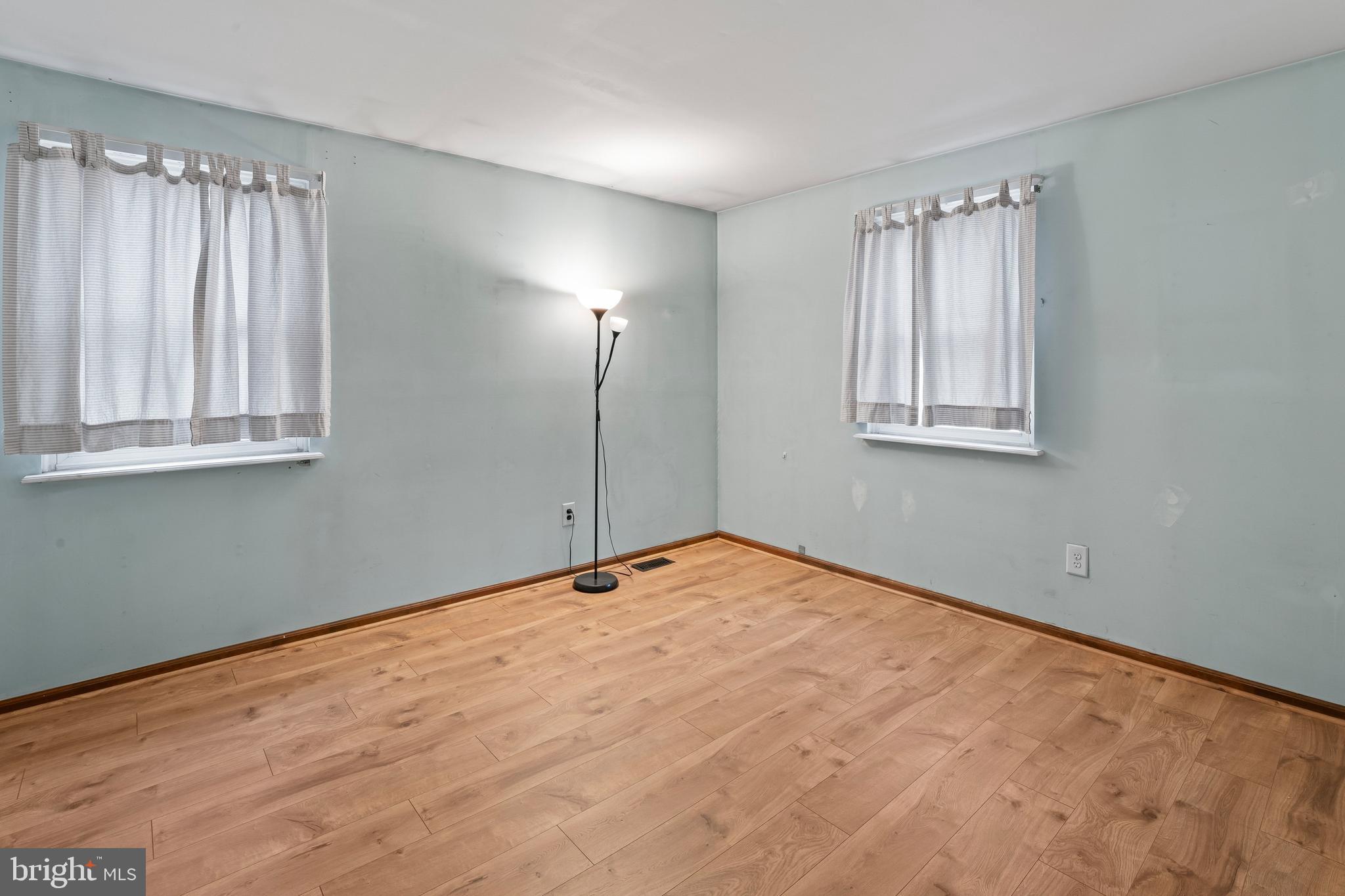 117 East 12th Avenue Pine Hill, NJ 08021 - Photo 9 of 19 a view of an empty room with a window