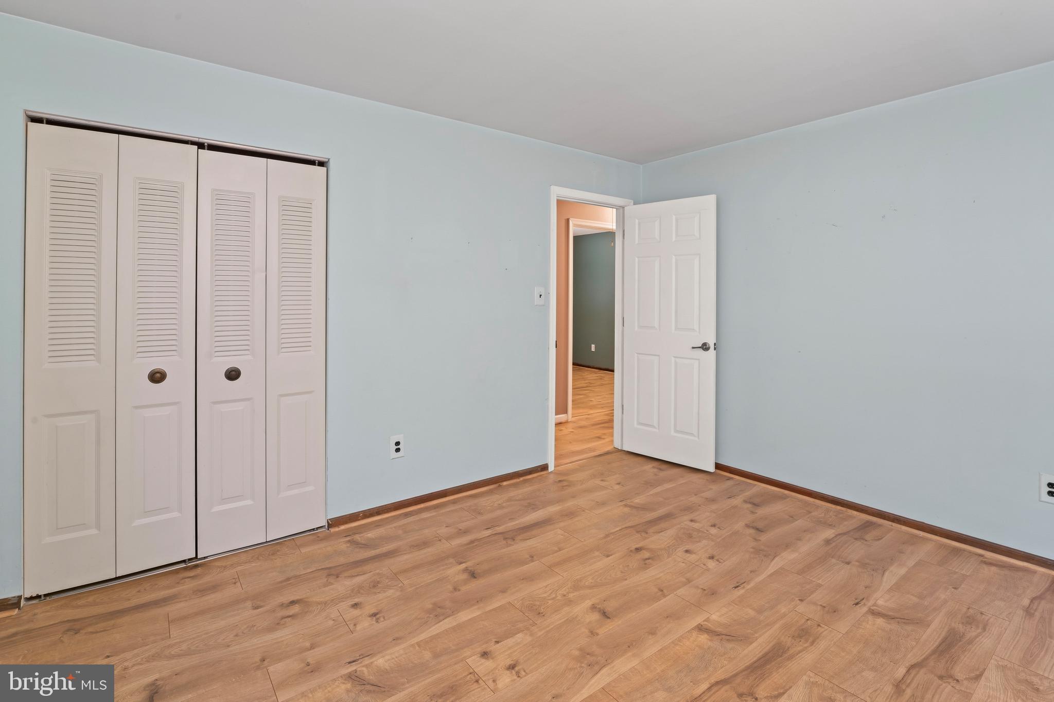 117 East 12th Avenue Pine Hill, NJ 08021 - Photo 10 of 19 a view of an empty room with wooden floor