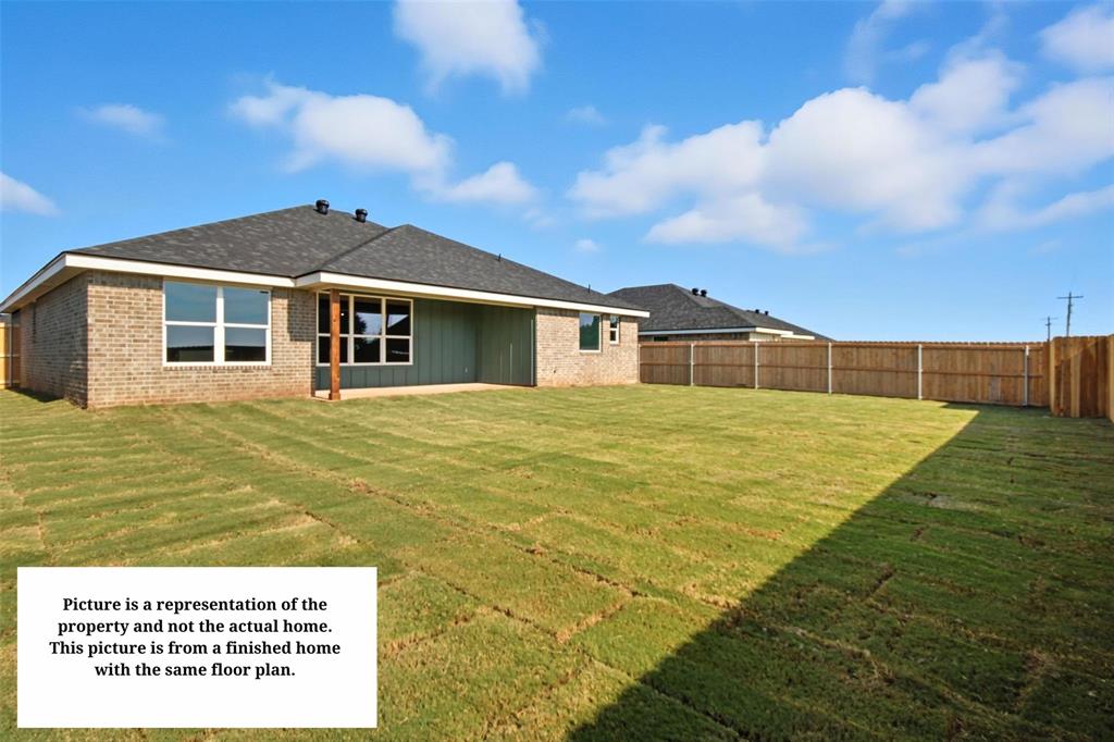 7635 Hudson Way Abilene, TX 79602 - Photo 16 of 17 a view of a house with a yard