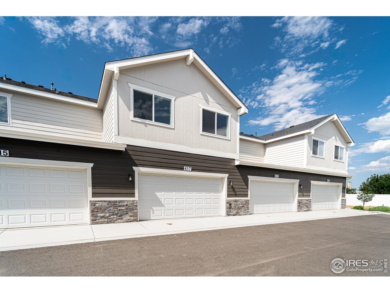 417 Condor Way Johnstown, CO 80534 - Photo 11 of 11 a front view of a house with a garage