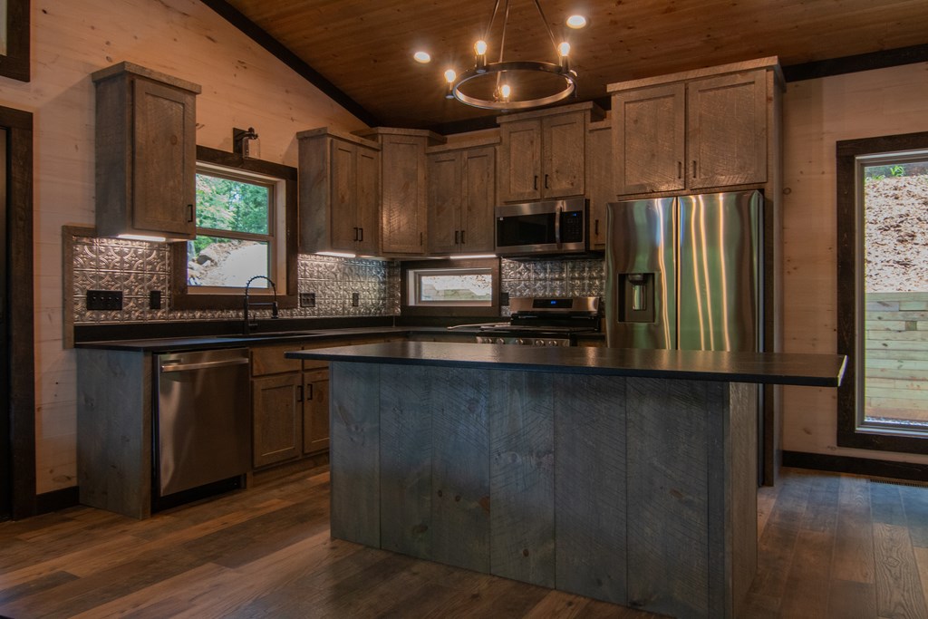 2 Clay's Way Cherry Log, GA 30522 - Photo 6 of 10 a kitchen with stainless steel appliances granite countertop a refrigerator a sink and a stove