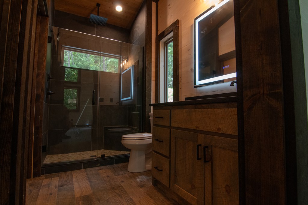 2 Clay's Way Cherry Log, GA 30522 - Photo 8 of 10 a bathroom with a toilet and a shower
