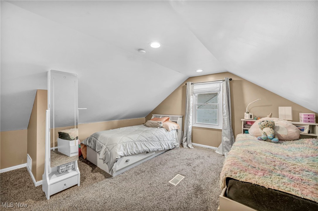 149 Jaycox Road Avon Lake, OH 44012 - Photo 28 of 42 Carpeted bedroom featuring baseboards and lofted ceiling