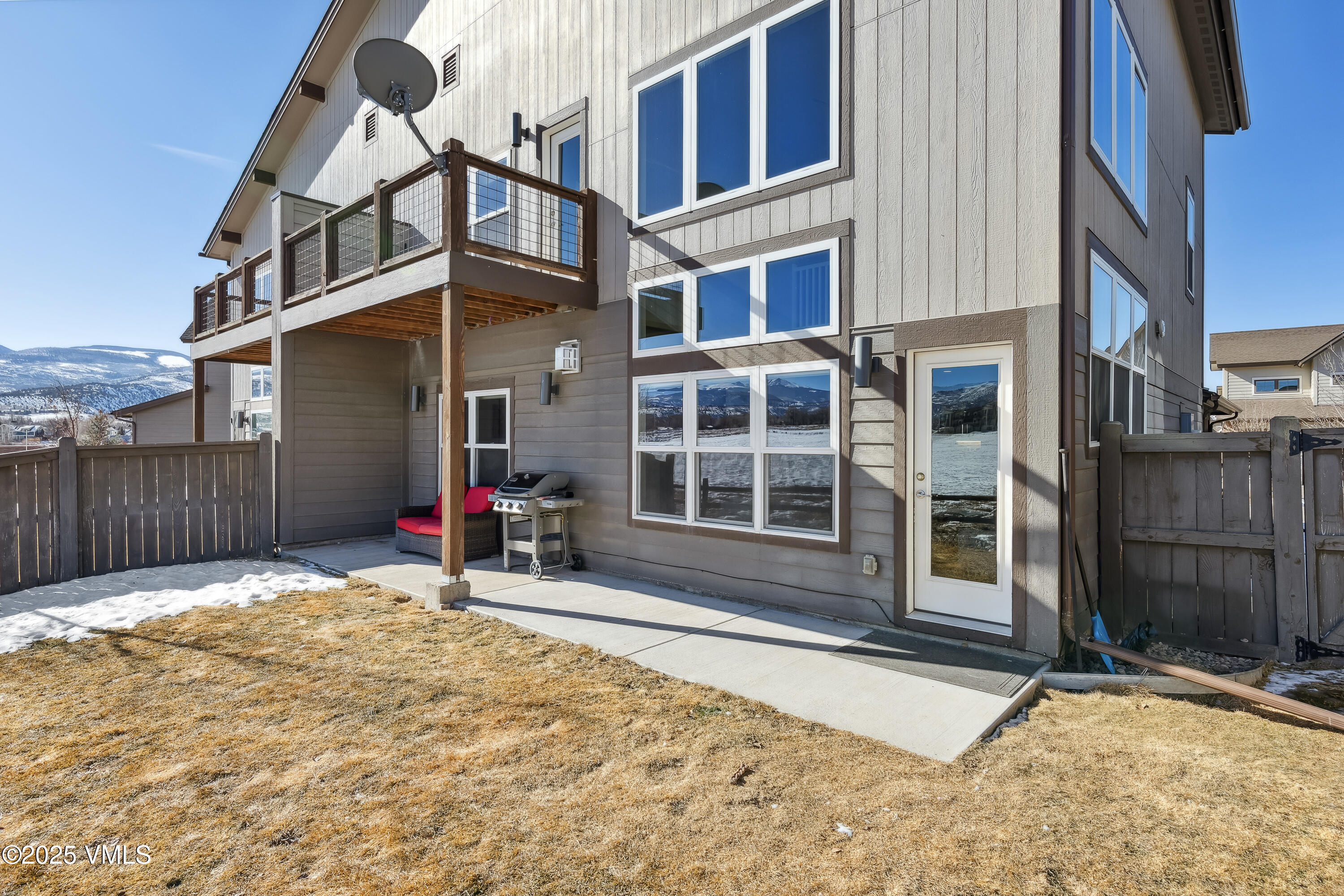 128 Soleil Circle Eagle, CO 81631 - Photo 37 of 42 a view of a house with a wooden fence