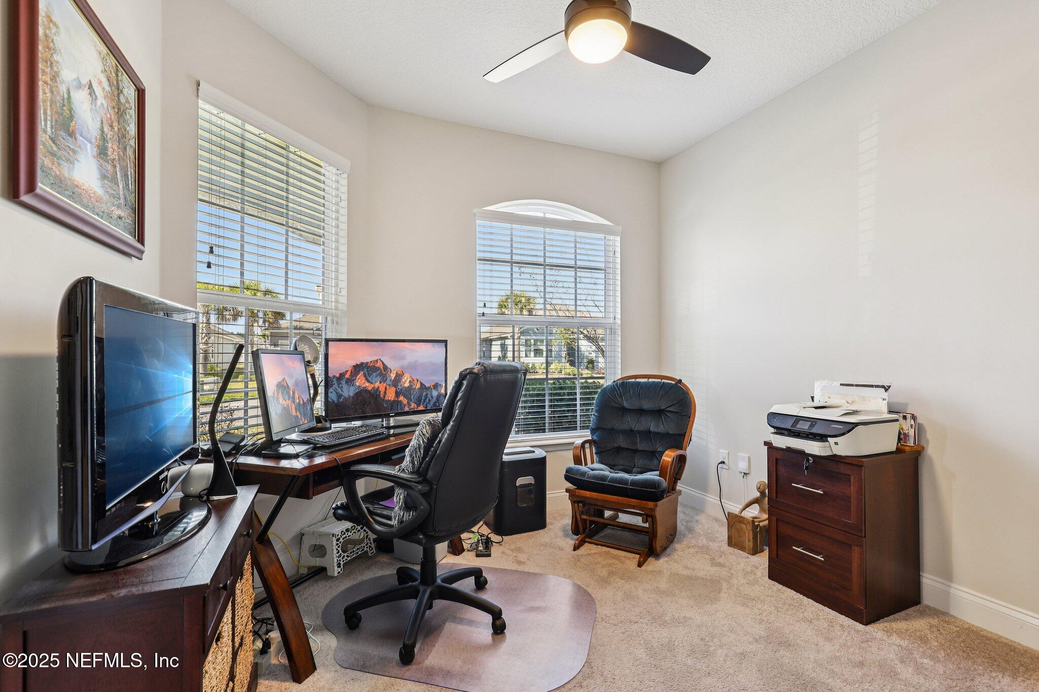 48 Fawn Field Lane St. Augustine, FL 32092 - Photo 11 of 73 a view of a workspace with furniture and a window