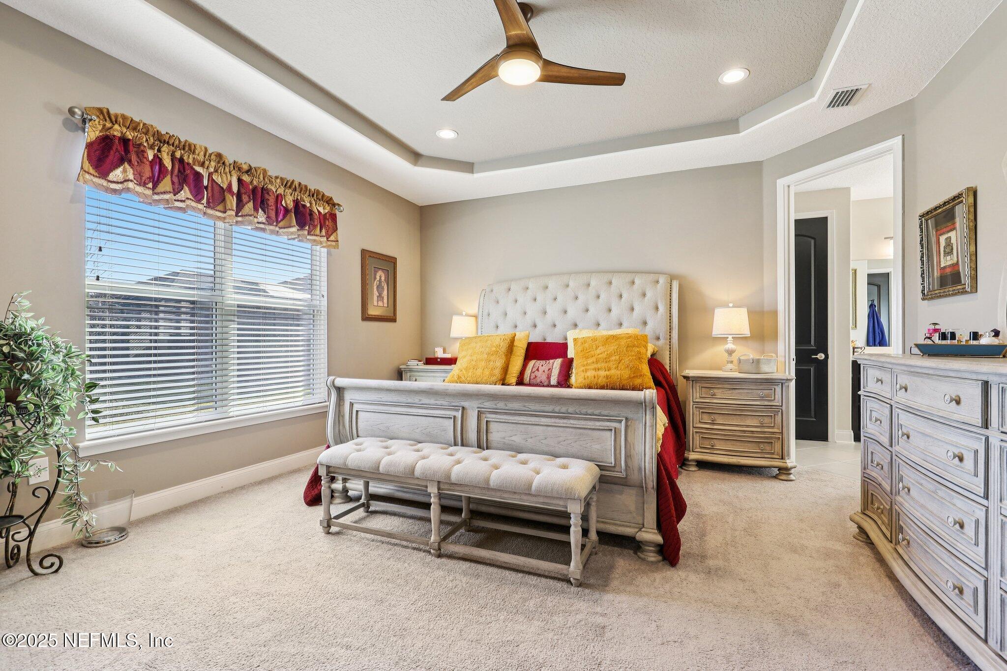 48 Fawn Field Lane St. Augustine, FL 32092 - Photo 22 of 73 a bedroom with furniture and a window