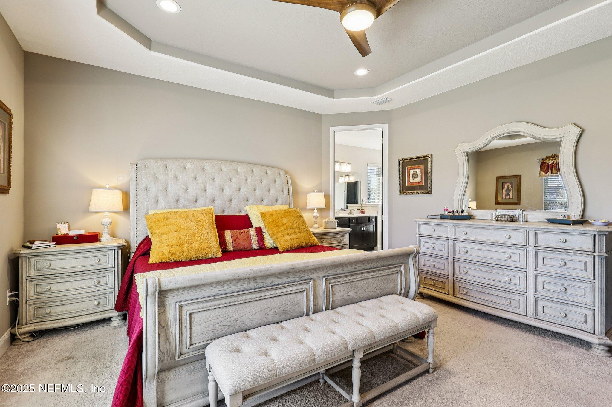 48 Fawn Field Lane St. Augustine, FL 32092 - Photo 25 of 73 a bedroom with a bed and a dresser