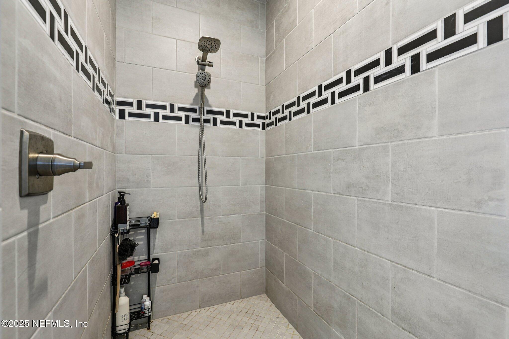 48 Fawn Field Lane St. Augustine, FL 32092 - Photo 28 of 73 a bathroom with a shower