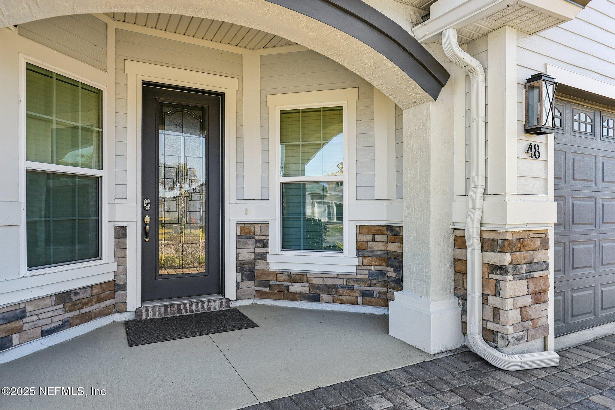 48 Fawn Field Lane St. Augustine, FL 32092 - Photo 3 of 73 a view of outdoor space deck and living room