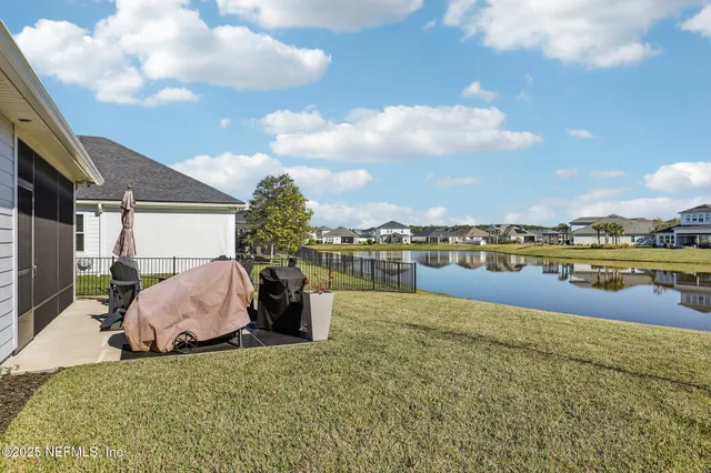 an aerial view of a building with a ocean view