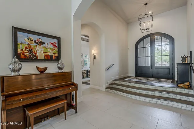a kitchen with granite countertop a refrigerator and a stove