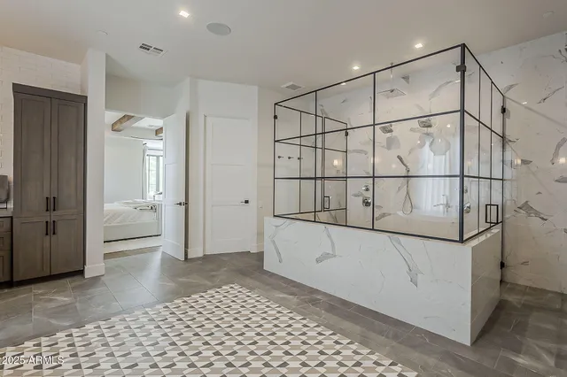 a view of a patio with a dining table and chairs with wooden floor