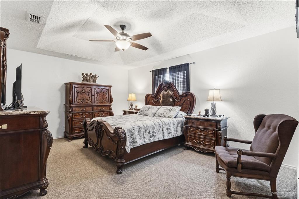 301 Cardinal Avenue McAllen, TX 78504 - Photo 16 of 17 a bedroom with a bed and furniture