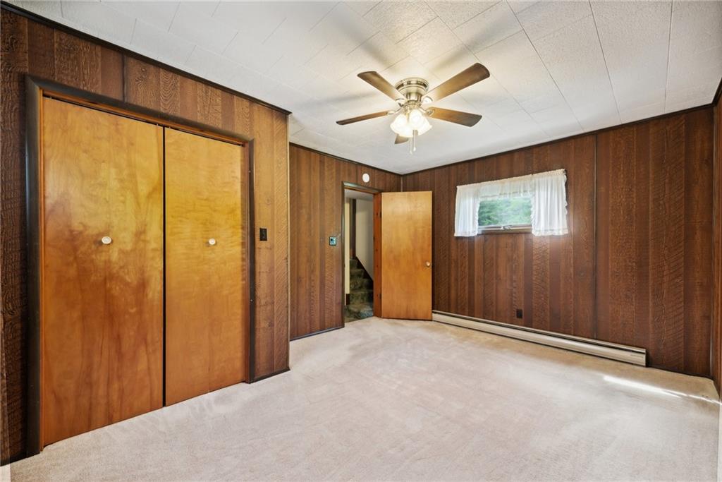 541 Buttermore Road Ruffs Dale, PA 15679 - Photo 14 of 26 a view of a big room with closet and windows