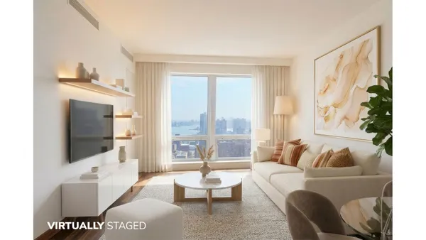 a living room with furniture a flat screen tv and a floor to ceiling window