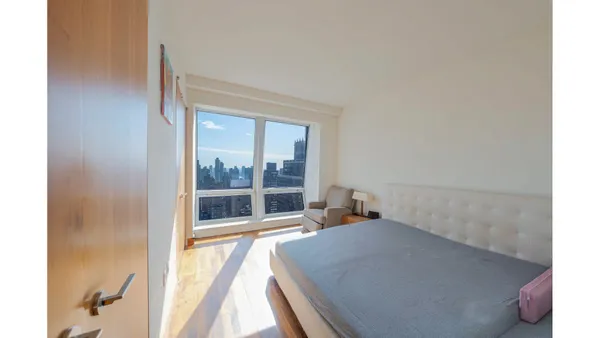 a view of an empty room and window
