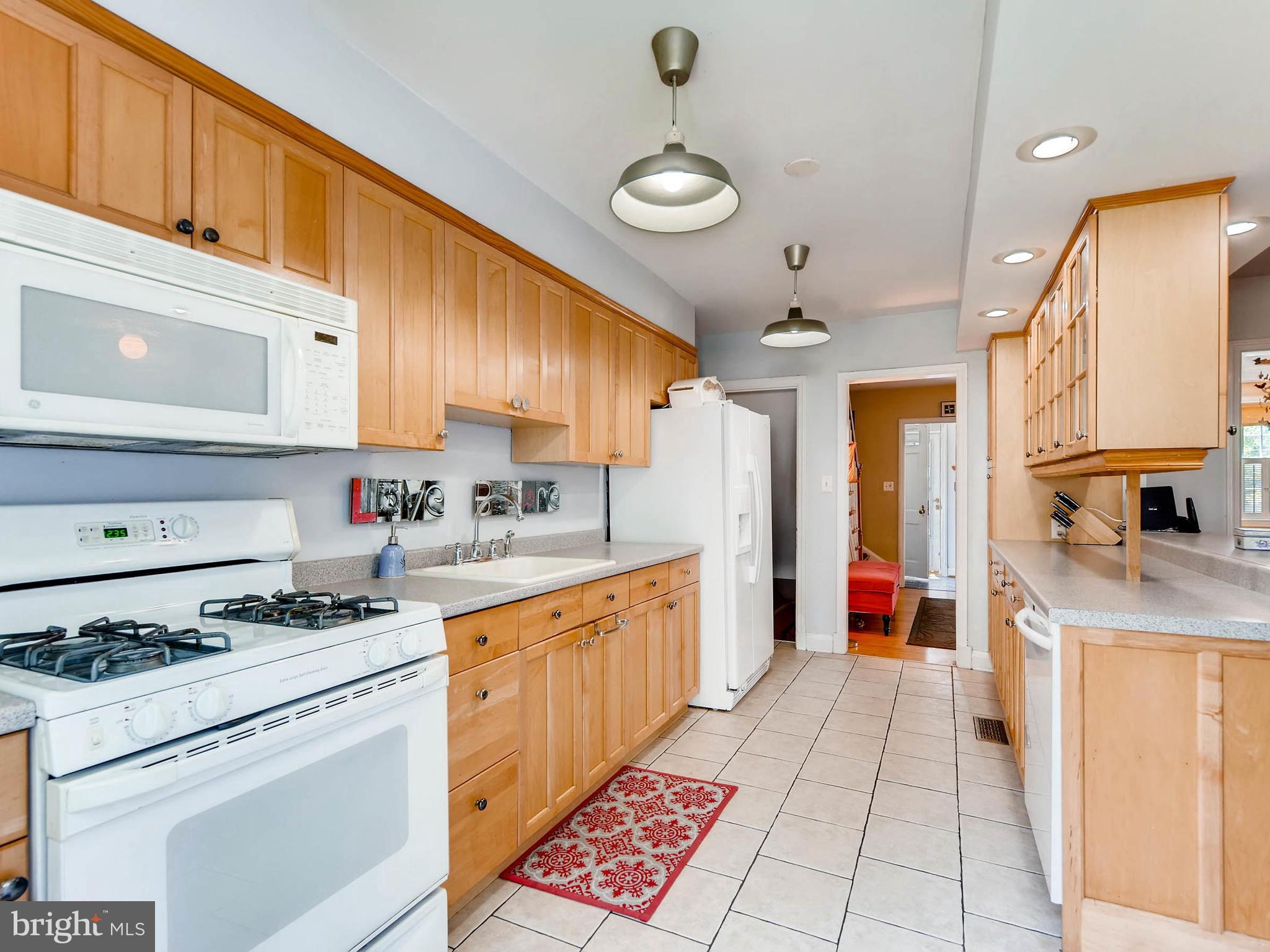 202 Blenheim Road Baltimore, MD 21212 - Photo 12 of 30 White appliances in the kitchen