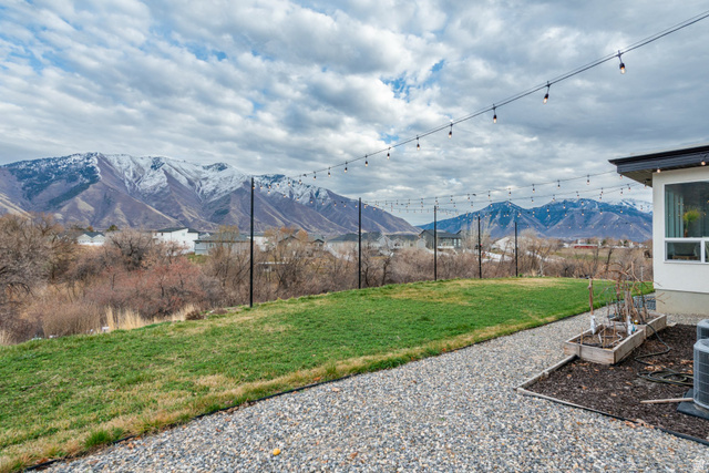 262 North Santa Fe Drive Mapleton, UT 84664 - Photo 27 of 28 View of green lawn with a mountain view
