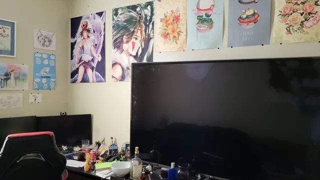 a kitchen with sink a refrigerator and cabinets