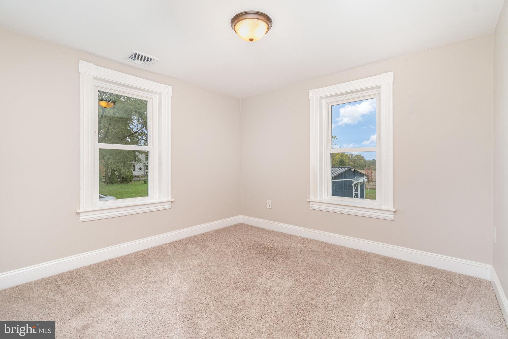 1103 Graystone Road Manheim, PA 17545 - Photo 17 of 24 an empty room with windows