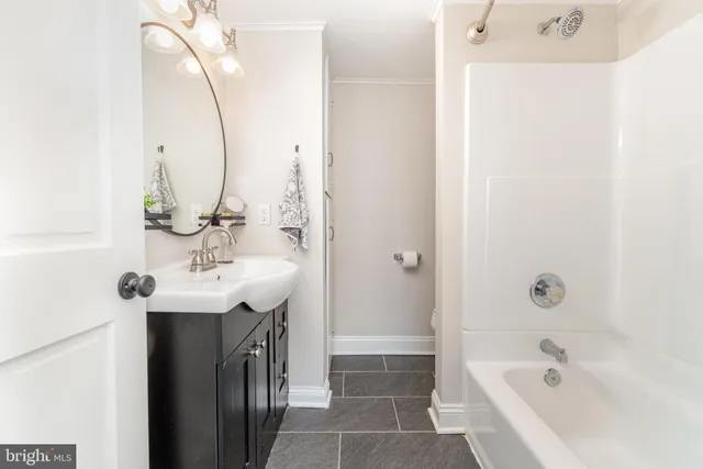 a view of a lake with a yard in front of it