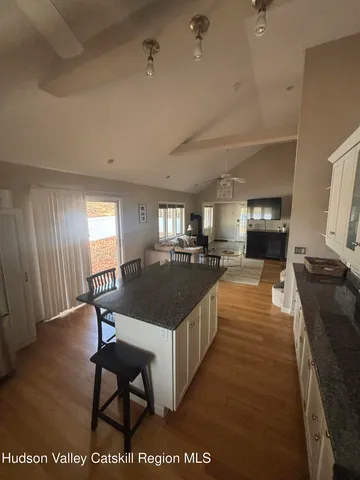 a large living room with a large window