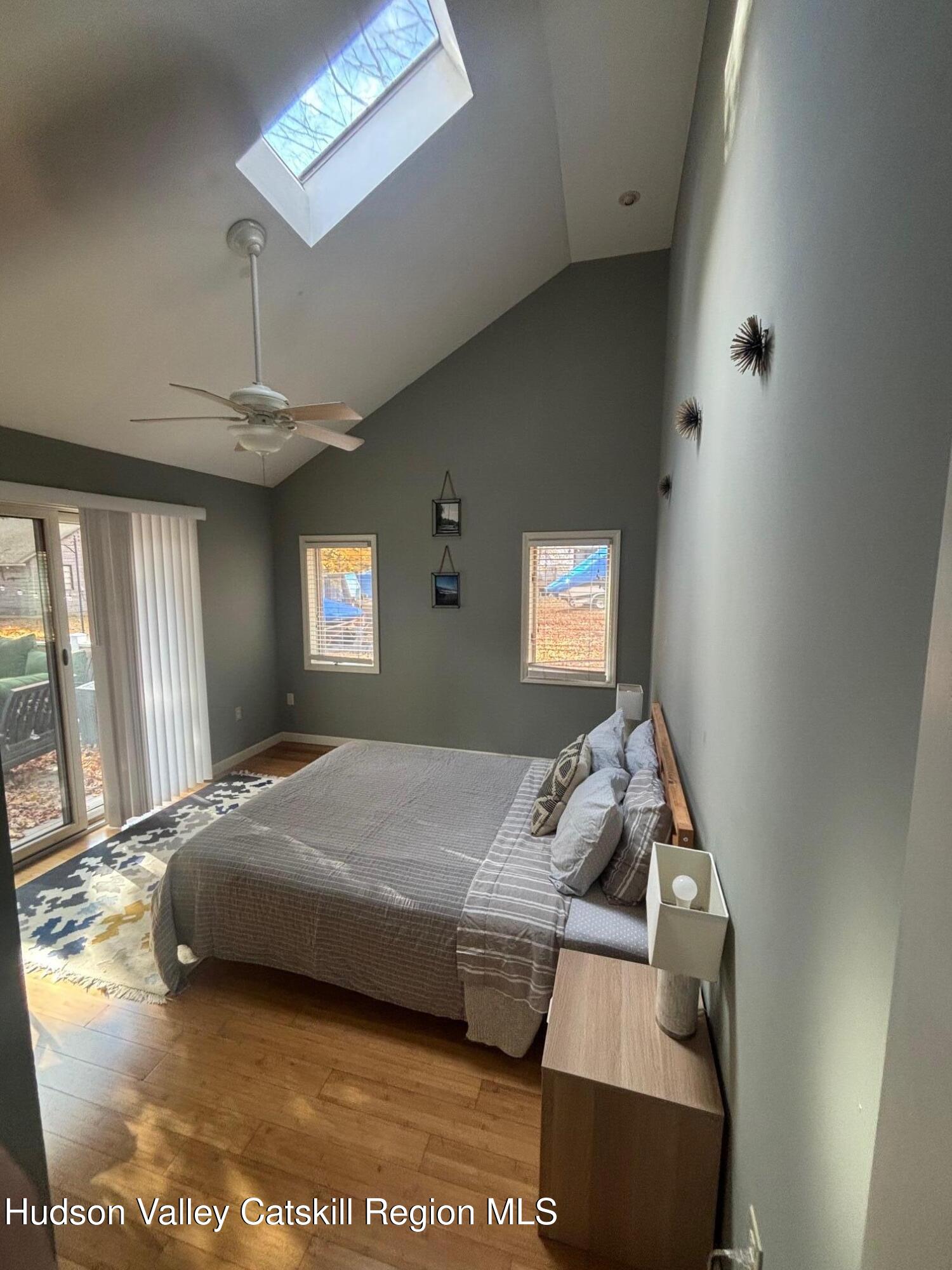 419 Southwest Colony Road Hillsdale, NY 12529 - Photo 8 of 10 a bedroom with a bed and window