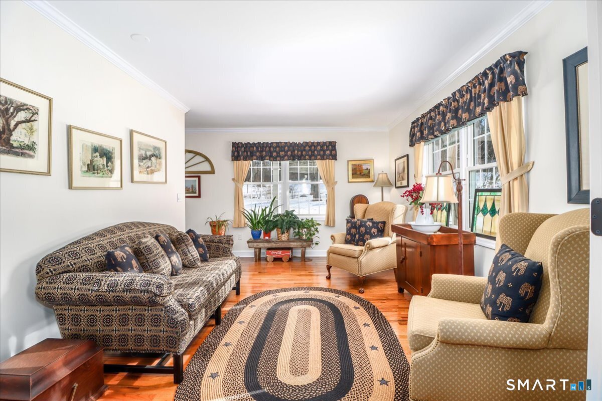 55 Washington Ridge Road New Milford, CT 06776 - Photo 21 of 40 a living room with furniture and a large window