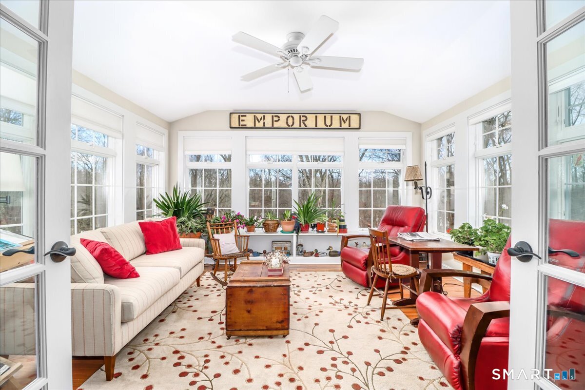 55 Washington Ridge Road New Milford, CT 06776 - Photo 24 of 40 a living room filled with furniture and a large window