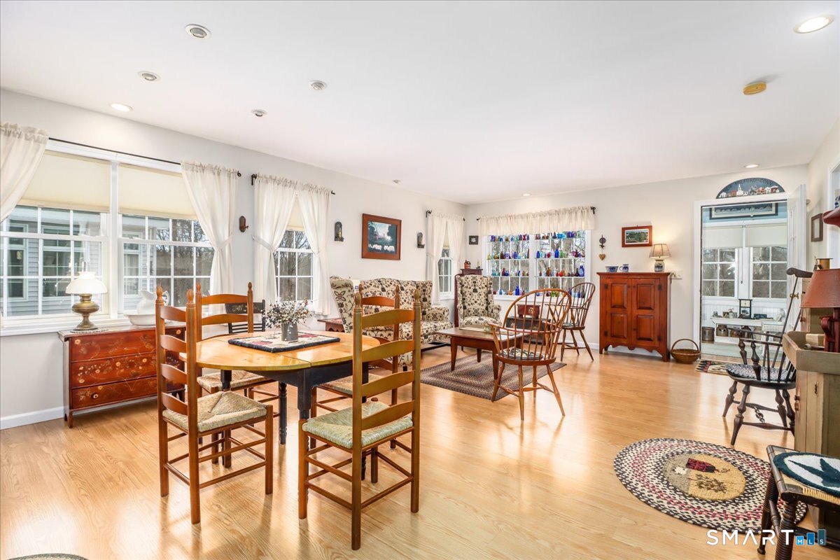 55 Washington Ridge Road New Milford, CT 06776 - Photo 36 of 40 a view of a dining room with furniture window and wooden floor