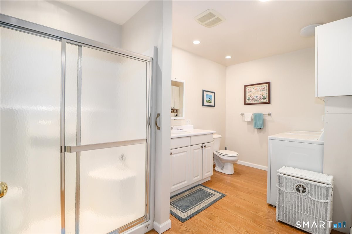 55 Washington Ridge Road New Milford, CT 06776 - Photo 39 of 40 a room with a refrigerator and a sink