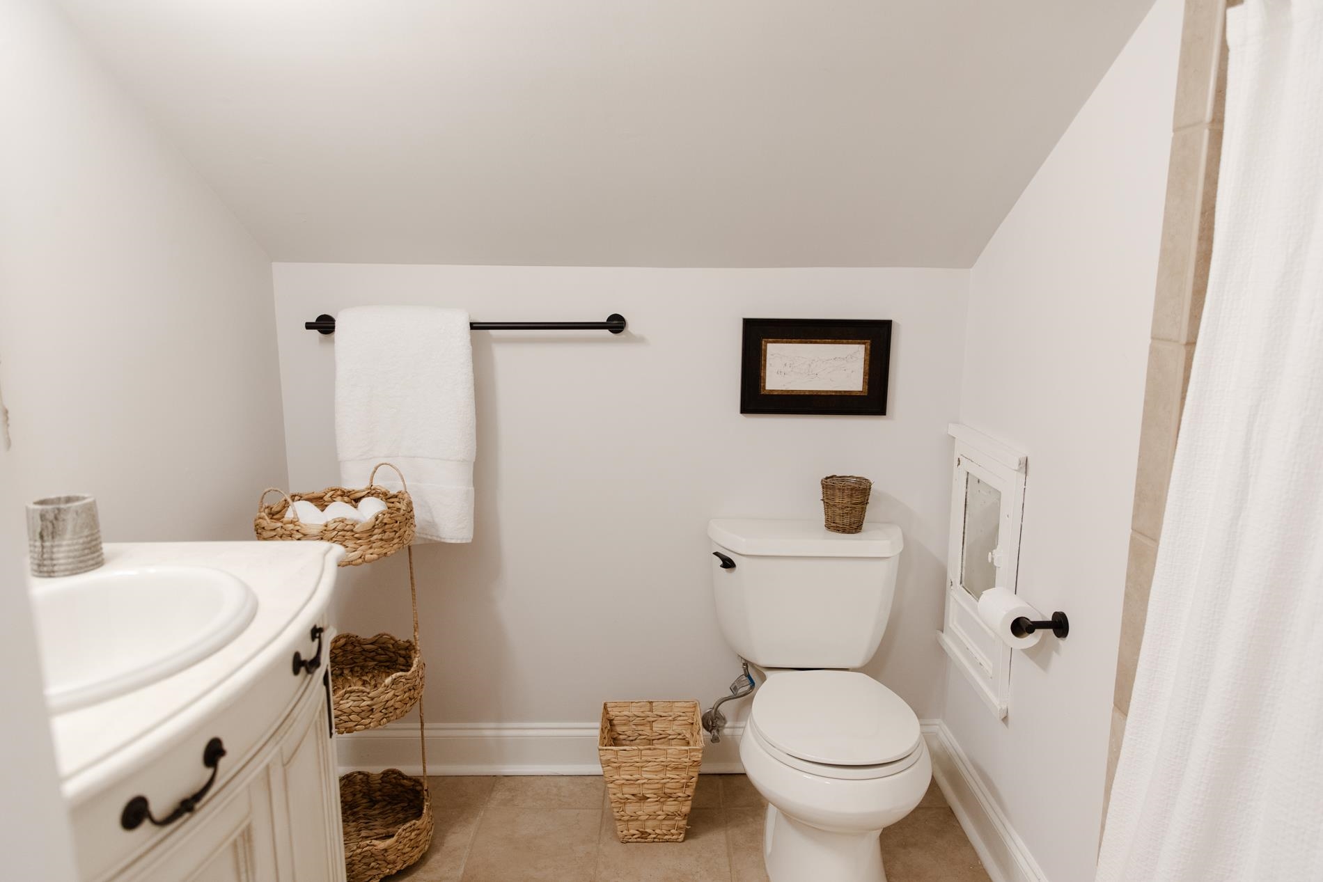 232 West Poplar Avenue Collierville, TN 38017 - Photo 24 of 36 Bathroom with vanity, light tile patterned floors, and curtained shower