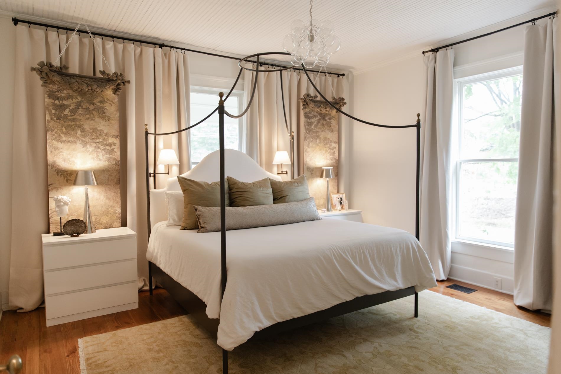 232 West Poplar Avenue Collierville, TN 38017 - Photo 25 of 36 Bedroom with wood finished floors and hanging lights