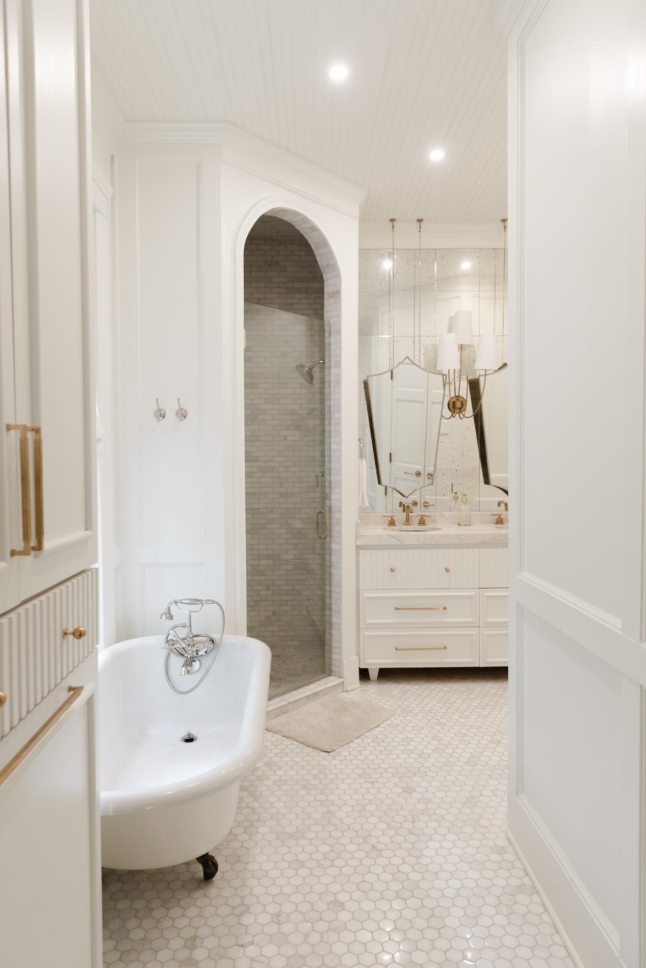 232 West Poplar Avenue Collierville, TN 38017 - Photo 30 of 36 Bathroom featuring a stall shower, double vanity, a freestanding tub, and recessed lighting