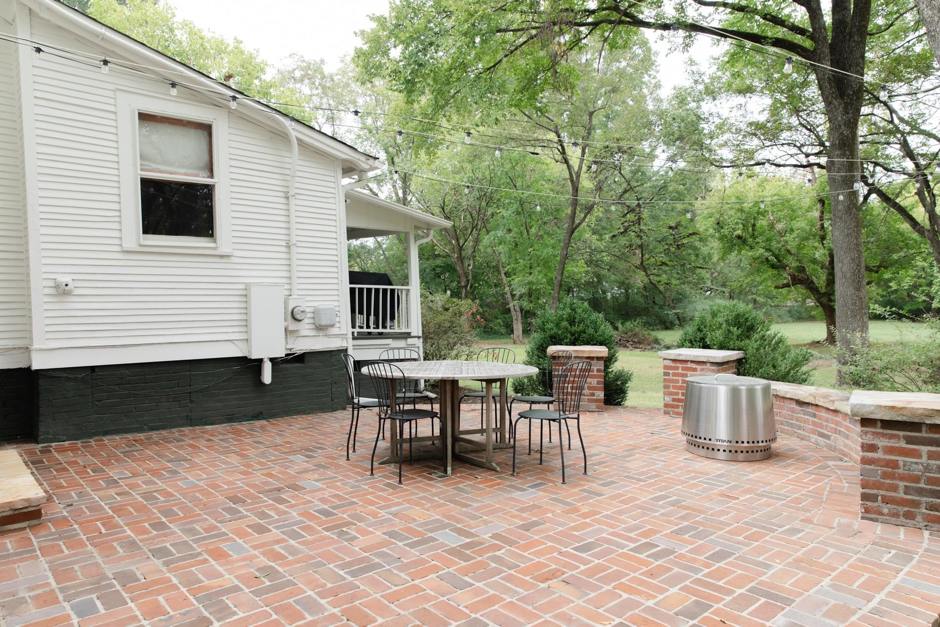 232 West Poplar Avenue Collierville, TN 38017 - Photo 34 of 36 View of patio with outdoor dining area