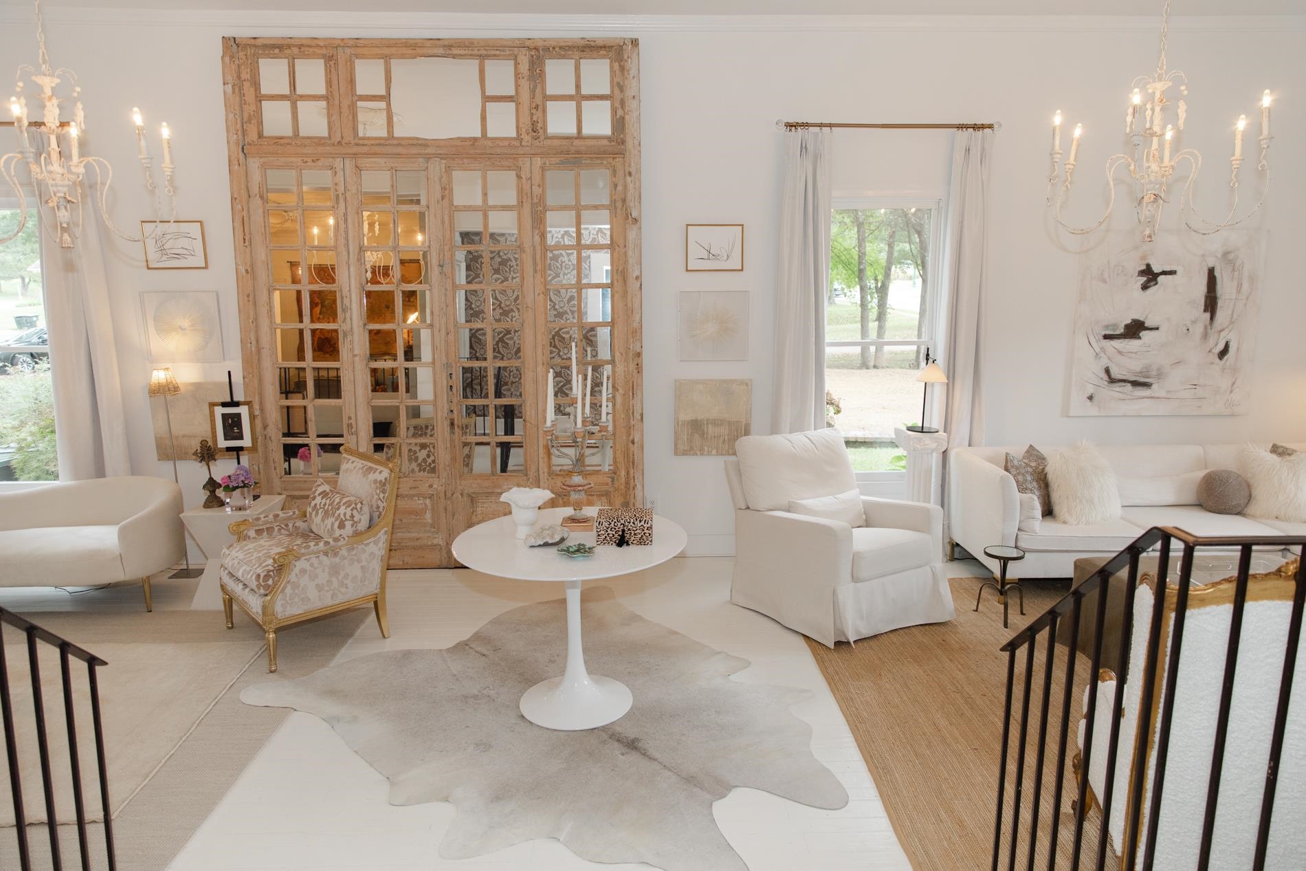 232 West Poplar Avenue Collierville, TN 38017 - Photo 7 of 36 Great room area with a chandelier and wood finished floors