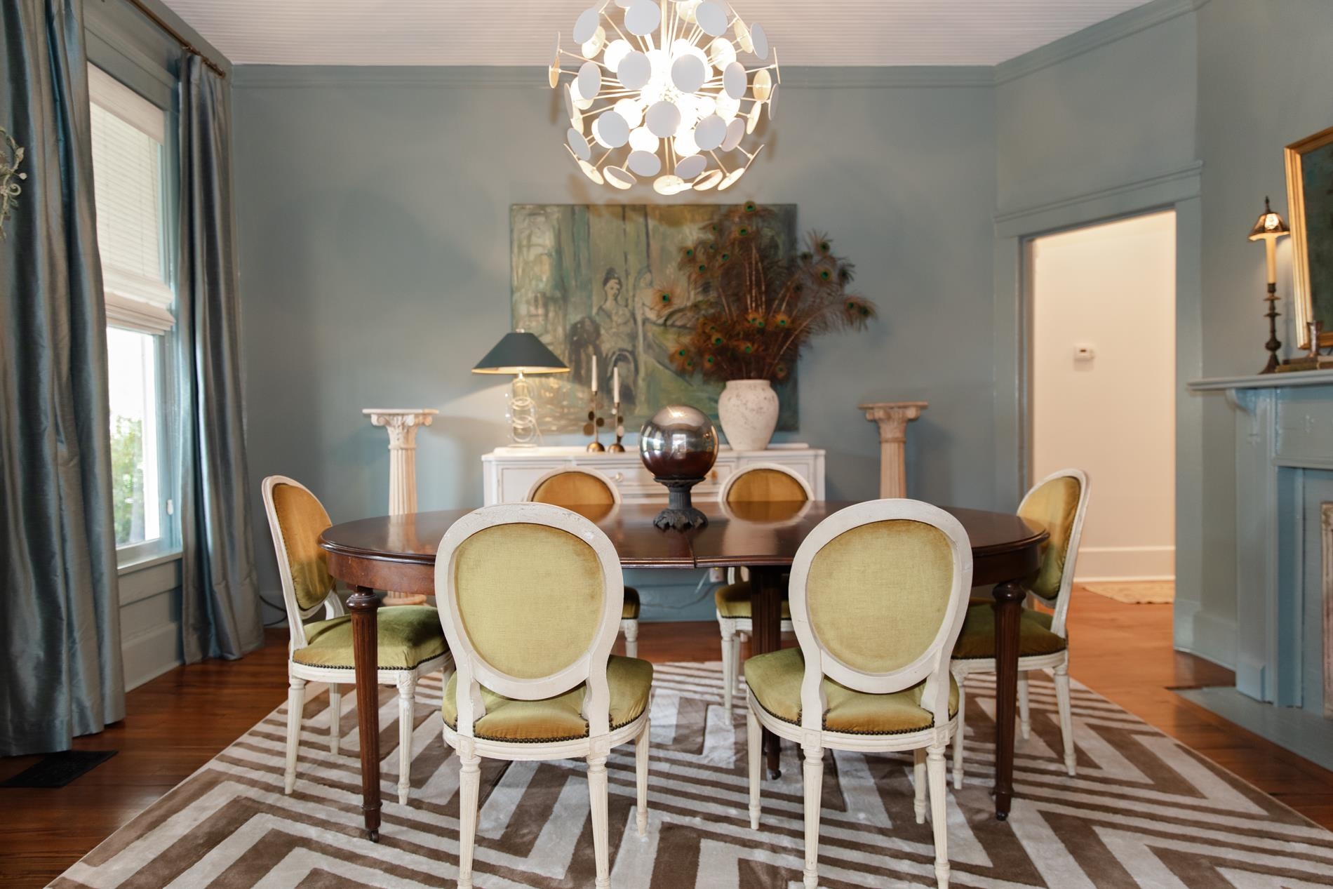 232 West Poplar Avenue Collierville, TN 38017 - Photo 8 of 36 Dining room with a chandelier, crown molding, and wood finished floors