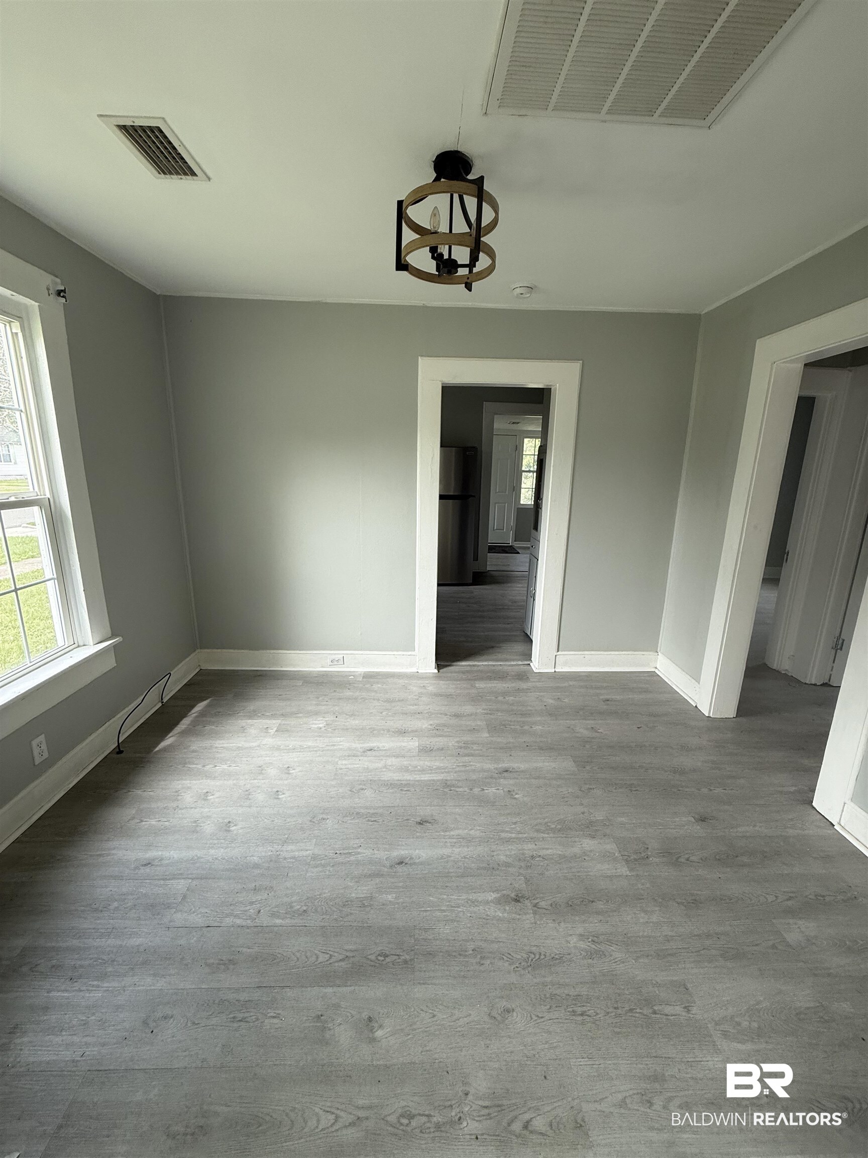 1848 Canal Street Mobile, AL 36606 - Photo 3 of 11 Unfurnished dining area featuring light wood-style floors