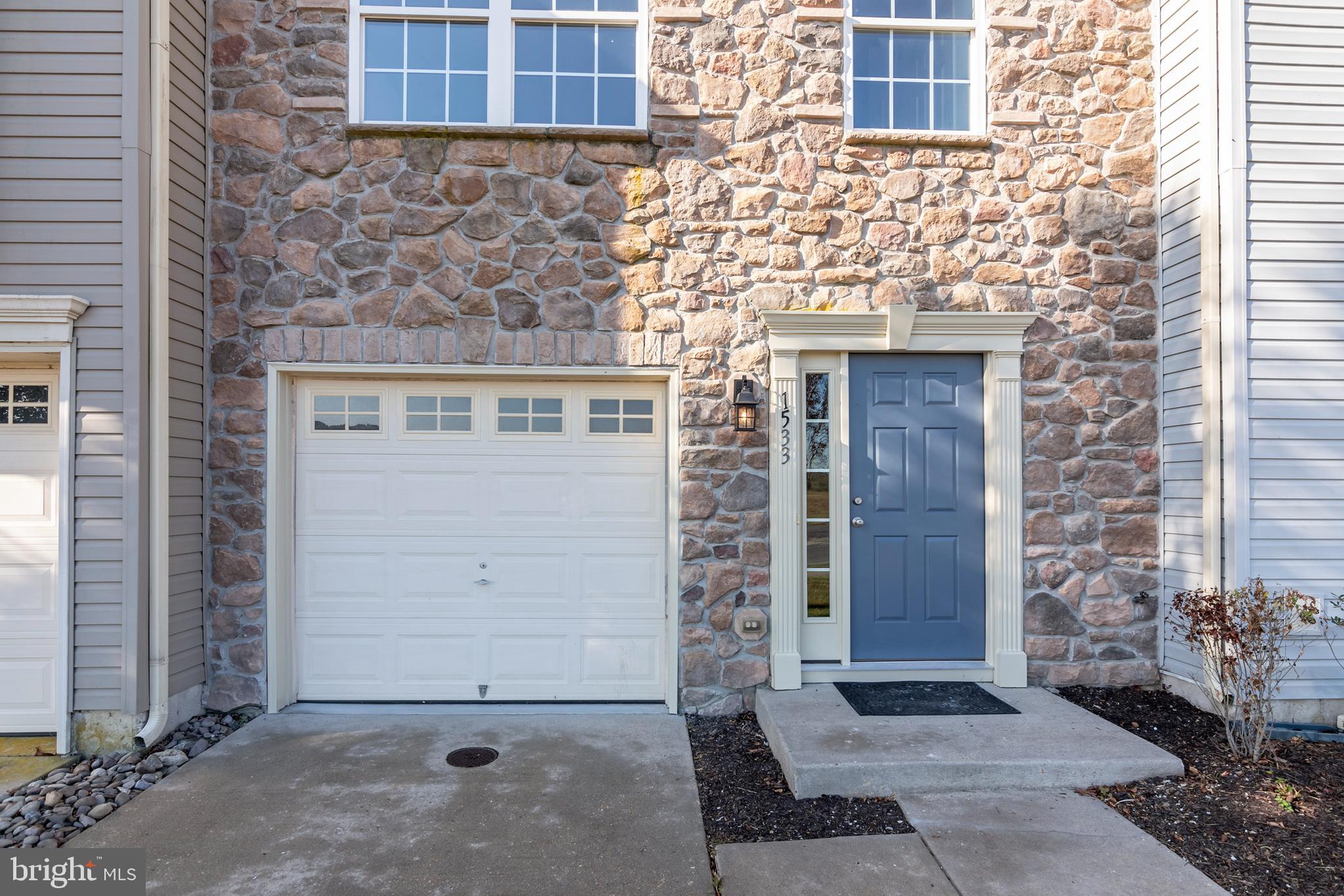 1533 Global Circle Cambridge, MD 21613 - Photo 5 of 27 a front view of a house with a yard