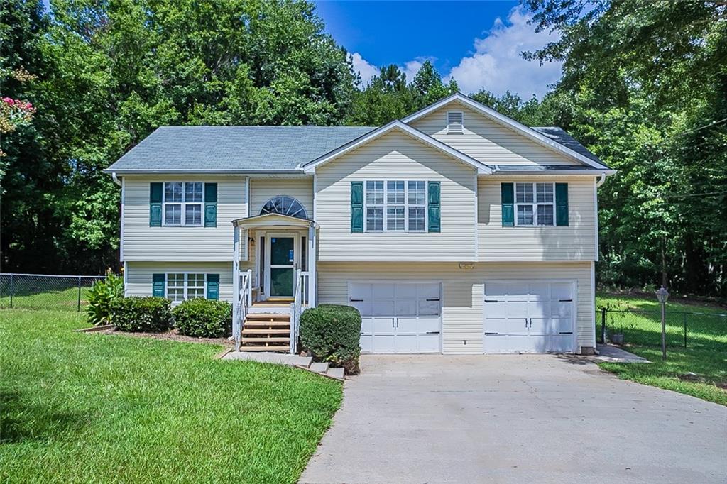 301 Willow Lane Temple, GA 30179 - Photo 1 of 1 front view of a house with a yard
