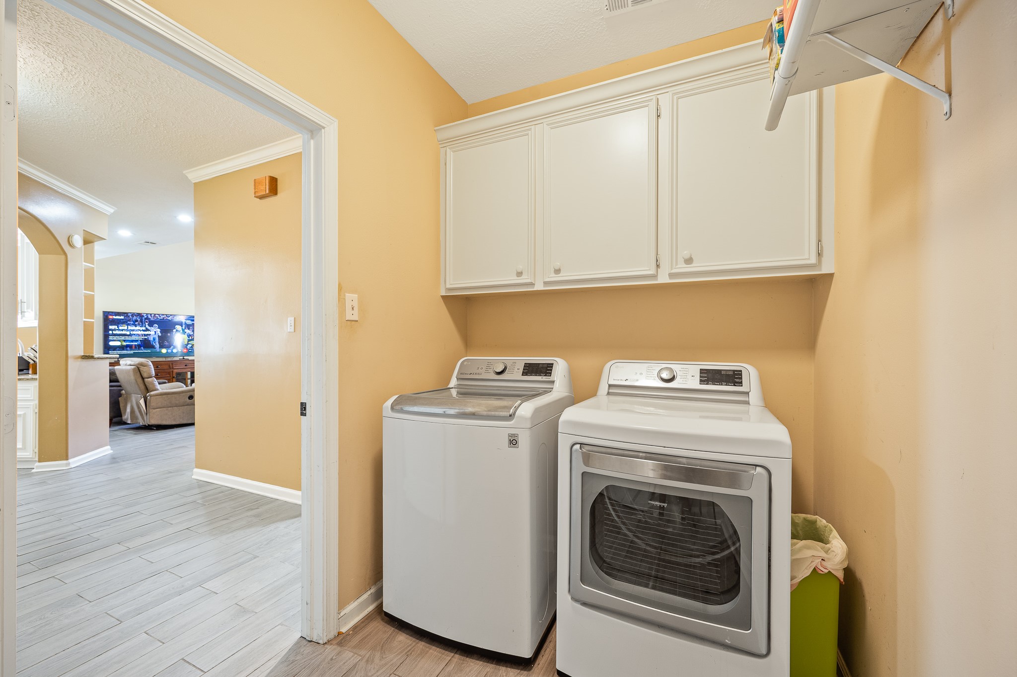 8111 Morningbrook Court Spring, TX 77379 - Photo 38 of 46 a utility room with dryer and washer
