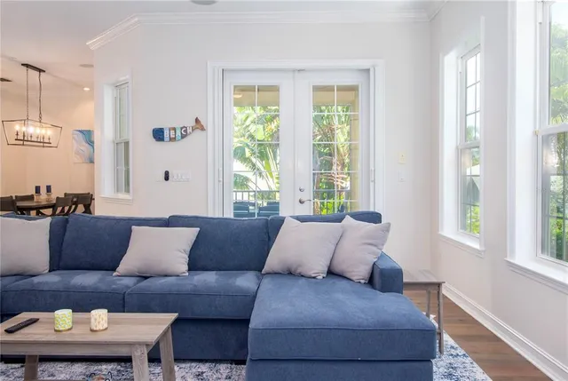 a kitchen with a sink a stove and cabinets